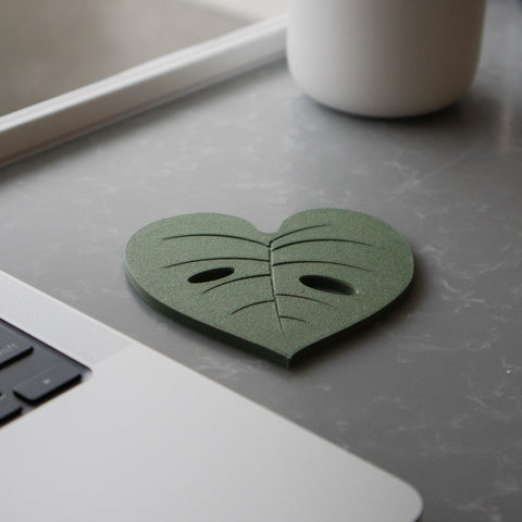 Leaf Heart of Coastera, a close look of the Monstera Plant Coaster on the table top